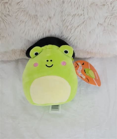 The Irresistible Charm of the Frog Squishmallow with a Tiny Witch Hat